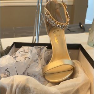 Gold embellished stilettos